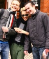 57260_Celebutopia-Kylie_Minogue_with_fans_as_she_leaves_her_London_home-01_122_678lo.jpg