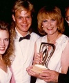 Kylie_Minogue_Jason_Donovan_Anne_Charleston_Ian_Smith_with_award.jpg